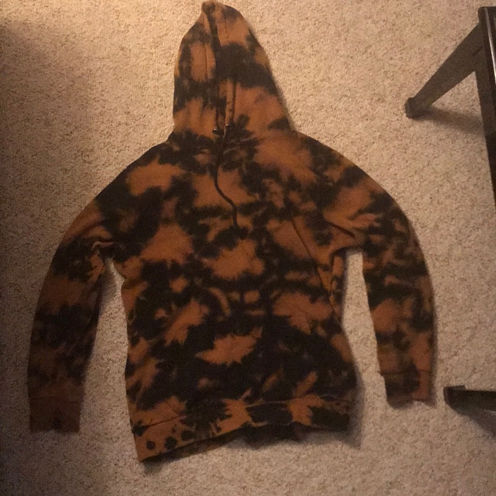 orange and black tie die sweater